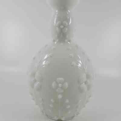 Bottle with embossed floral sprays (reverse side)