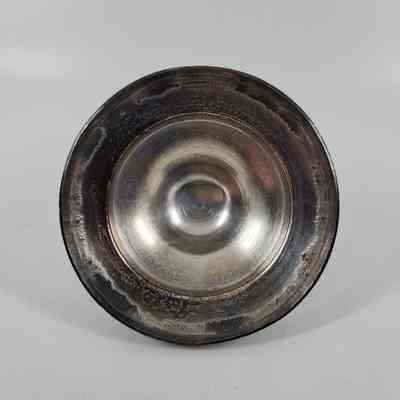 Bottom of silver plated lid