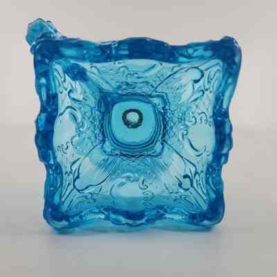 Bottom of blue glass oil lamp