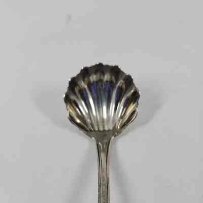 Bowl of spoon with shell design