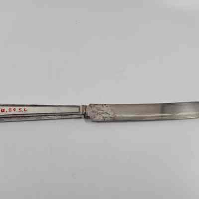 Back of silver dinner knife