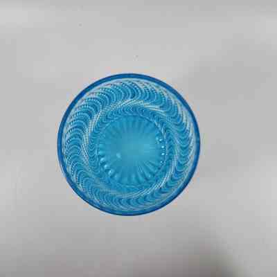 Top down view of blue glass tumbler
