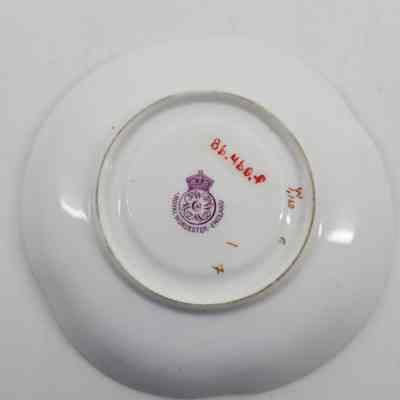 Bottom of saucer with makers mark "ROYAL WORCESTER ENGLAND"