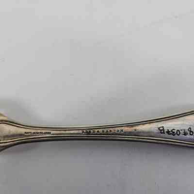 "PAT'D MAR 30 1869", "REED & BARTON" engraving, and accession number on the back of the handle