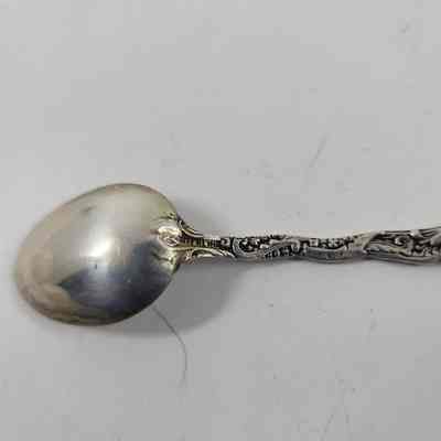 "Sterling" engraving on back of spoon handle