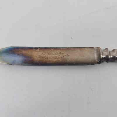 Engraving "1847 Rogers Bros Warranted" and blade discoloration