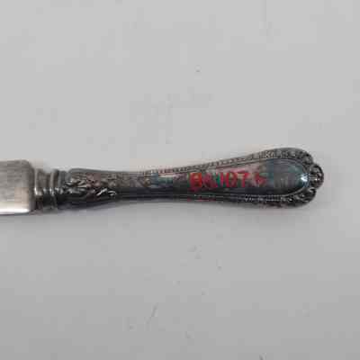 Back of handle showing discoloration and accession number - 86.107h