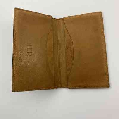 Interior: Pockets and “NCR” monogram.