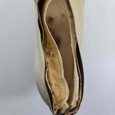 Interior of shoe with inner cloth pulling apart