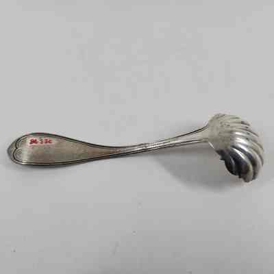 Back of silver sauce ladle