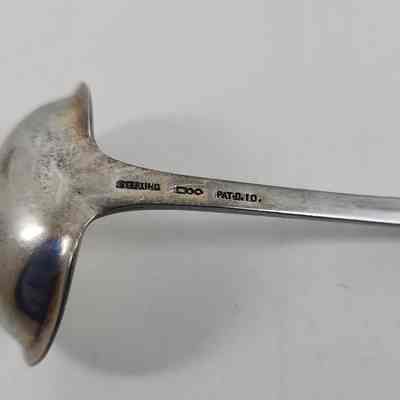 Engraving "STERLING" and "PATD 10"