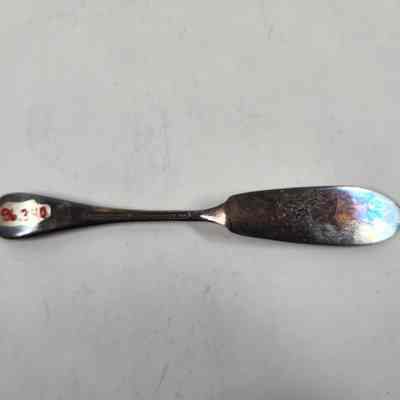 Back of silver butter knife
