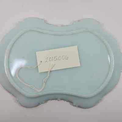 Bottom of blue milk glass tray