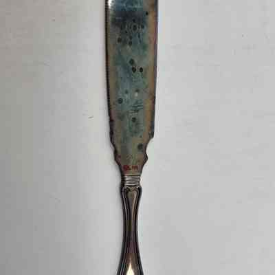 Back of dessert knife with discoloration on the blade