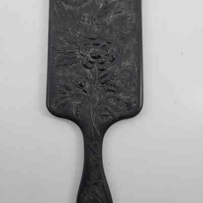 Back of mirror with floral design