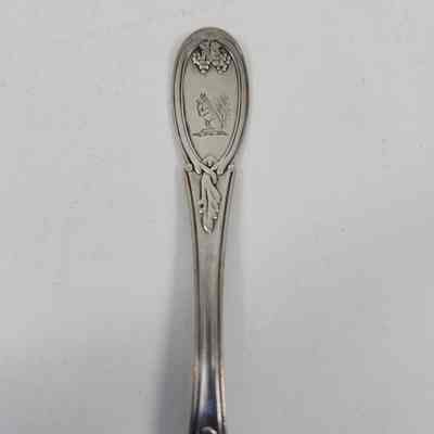 Squirrel engraved on the handle