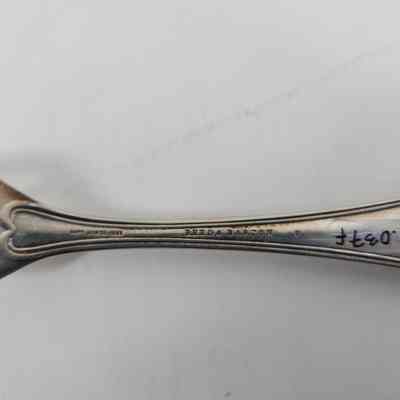 "PAT'D MAR 30, 1869" and "REED & BARTON" engraving with accession number on the back of the fork handle