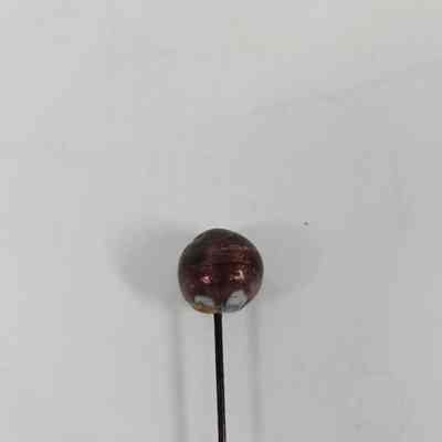 Red pinhead with white coloring on the bottom
