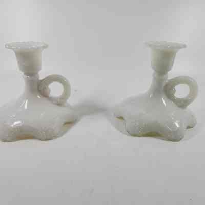 Pair of two milk glass candlesticks