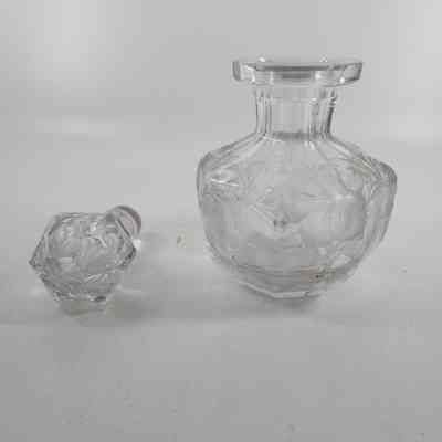 Glass cologne bottle with stopper removed