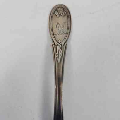 Squirrel engraved on the handle of the spoon