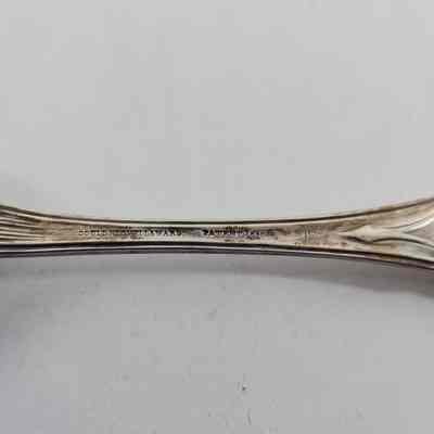 Engraving "GOULD, STOWELL & WARD PATENT 1850 11-12" on back of spoon handle
