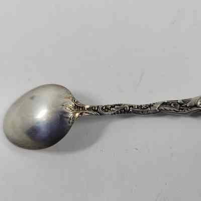 "Sterling" engraving on back of spoon handle
