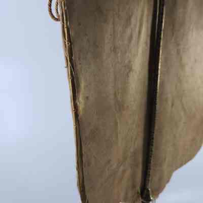 Candle screen has separated around edges showing backing