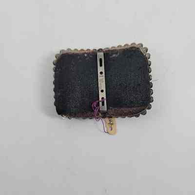 Back of black leather shoe buckle