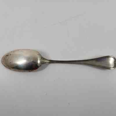Back of silver serving spoon