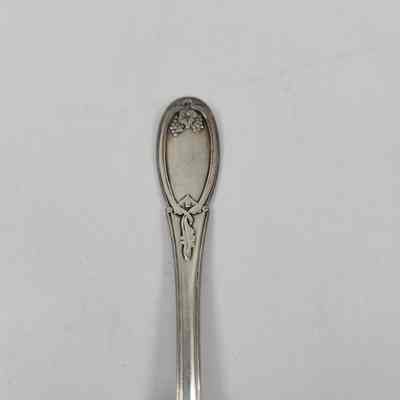 Grapes and leaves engraving on handle