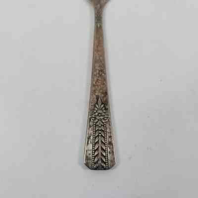 Floral design on handle of butter knife