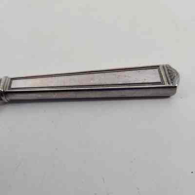 Floral engraving on handle