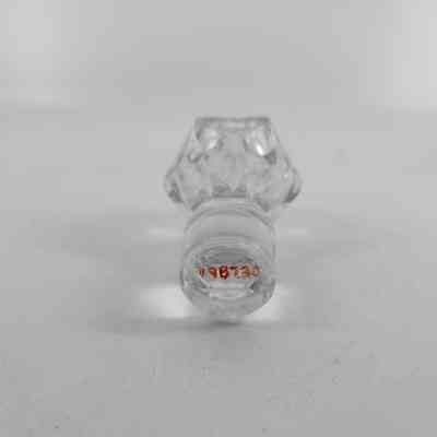 Bottom of glass cologne bottle stopper