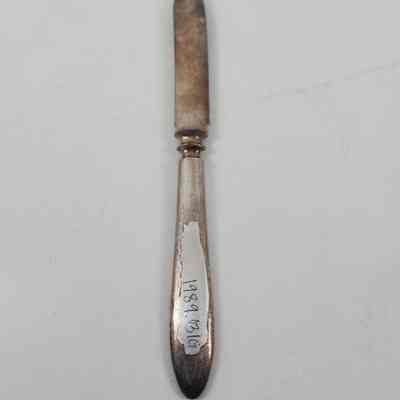Back of knife with accession number