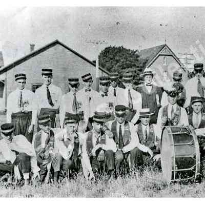 Photograph: Orange Young Britons (O.Y.B.) #74, Stittsville Train Station, c. 1920