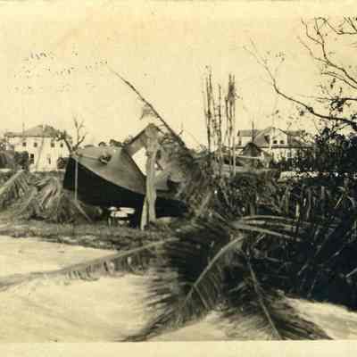 View of the destruction to a boat and palm trees by the Sept. 18,m 1926 Hurricane, Ft. Lauderdale Fl.