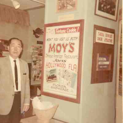 George Moy with Restaurant Ad