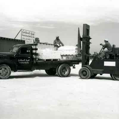 Unloading Pallet of Bricks from a Caldwell-Scott Construction Company Truck