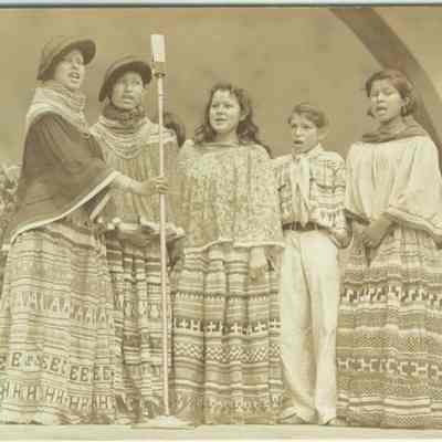 Seminole youth singing at park, 1920s