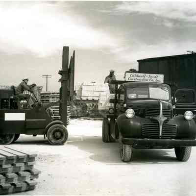 Unloading Pallet of Bricks from a Caldwell-Scott Construction Company Truck
