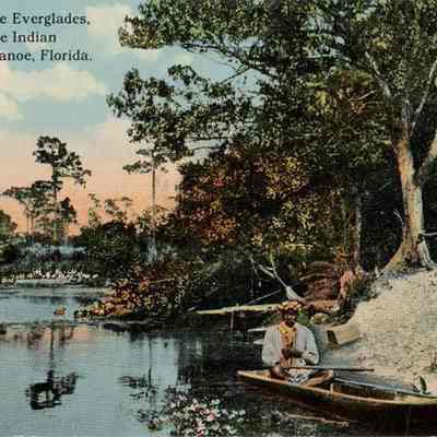 Scene in the Everglades, Seminole Indian in Dug-Out Canoe, Florida