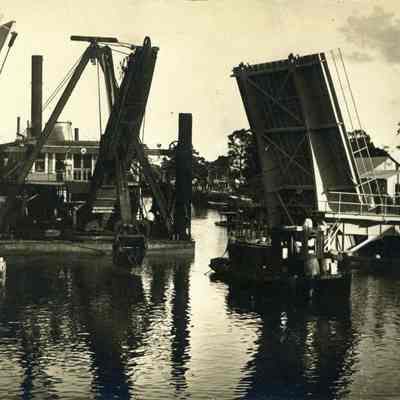 Andrews Ave. Bridge in open postion with a large dredge coming through