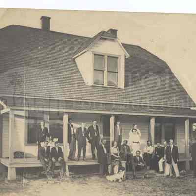 People on front porch of Comm. A. H. Brook Home
