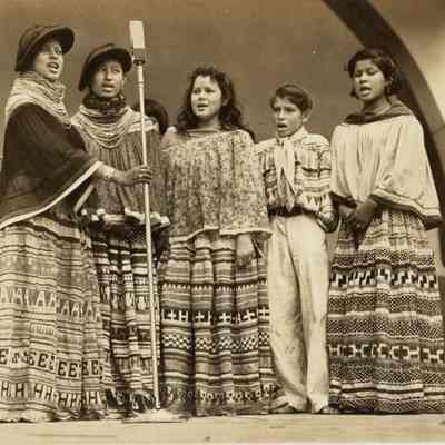 Seminole youth singing at park, 1920s