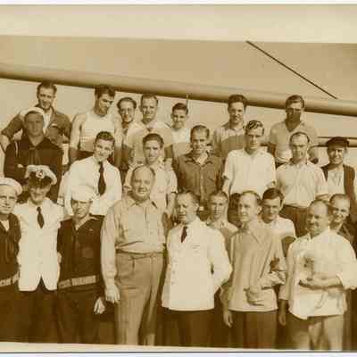 Unidentified Men and Sailors Standing Aboard a Ship