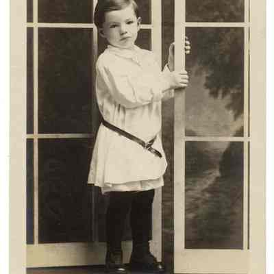 Boy with glass door