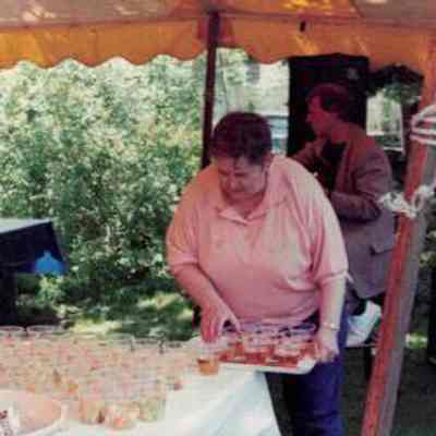 Volunteer sets up drinks