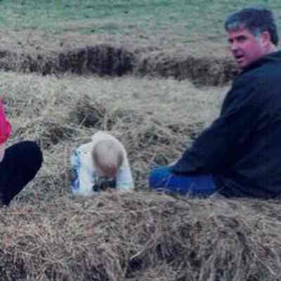 Attendees on hay bales