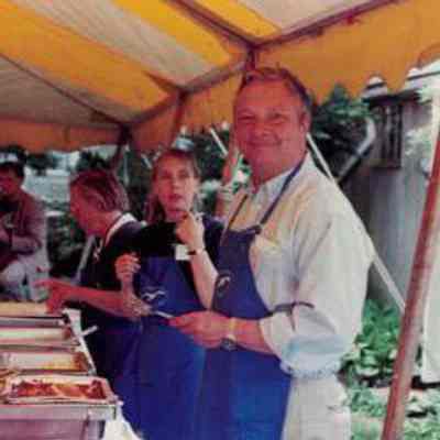 Volunteers at breakfast serving stations